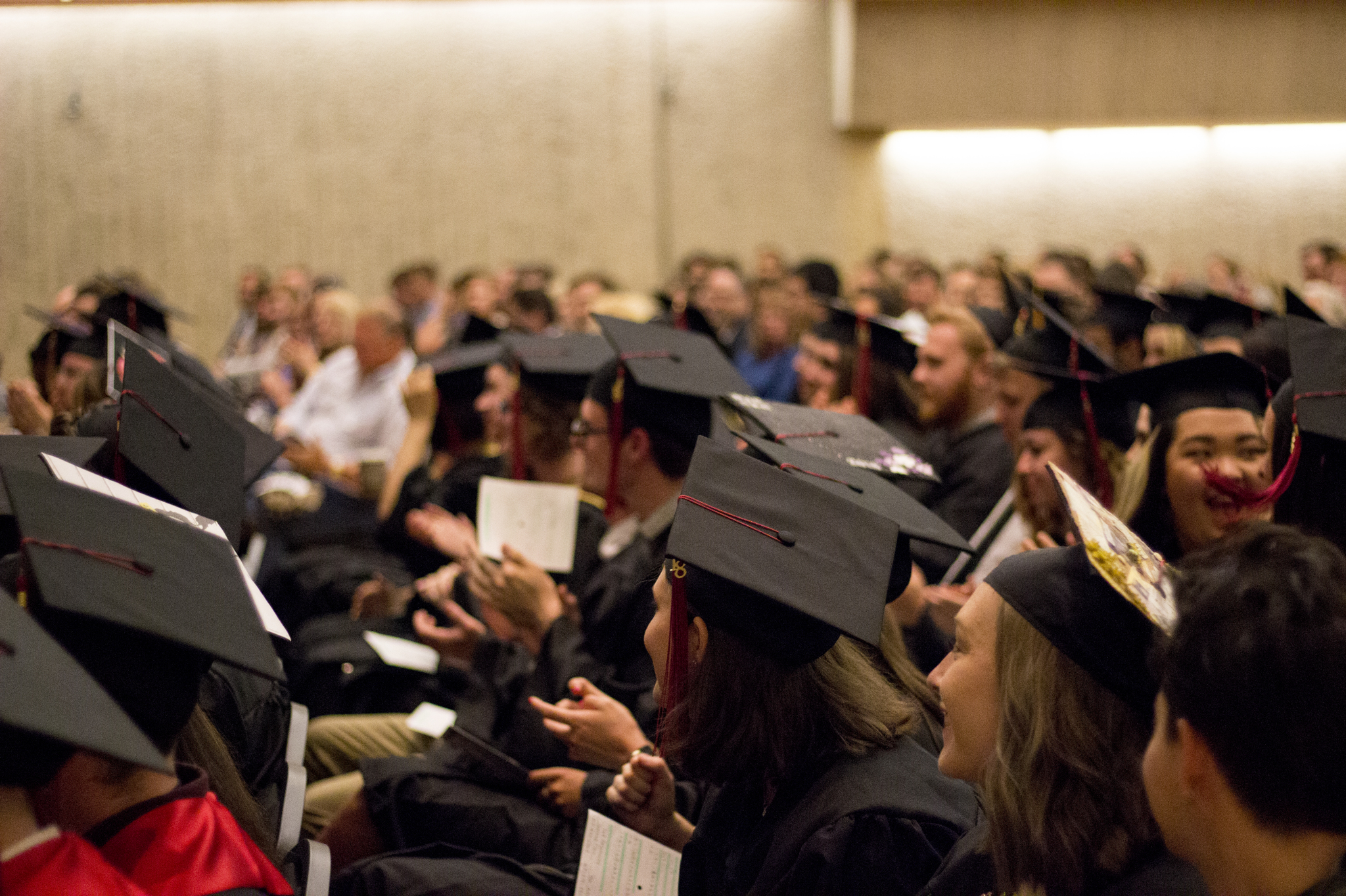 Students clapping at graduation